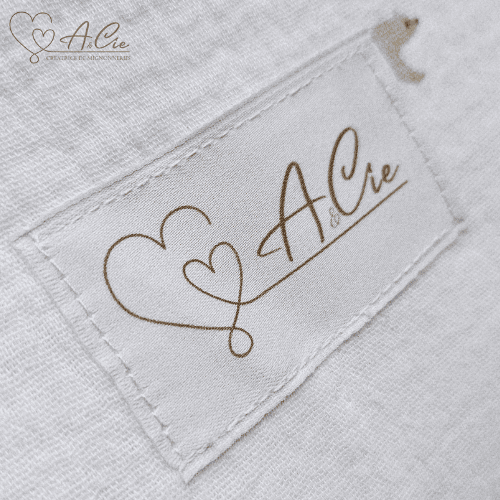 Etiquette marque Anaë et compagnie sur chancelière collection Brise polaire